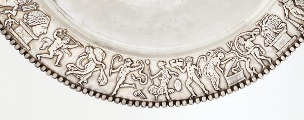 Dancing satyrs and a bacchant on the rim of the Achilles platter