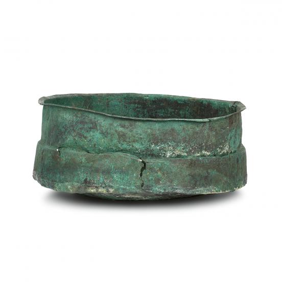 The copper cauldron used for concealing the treasure